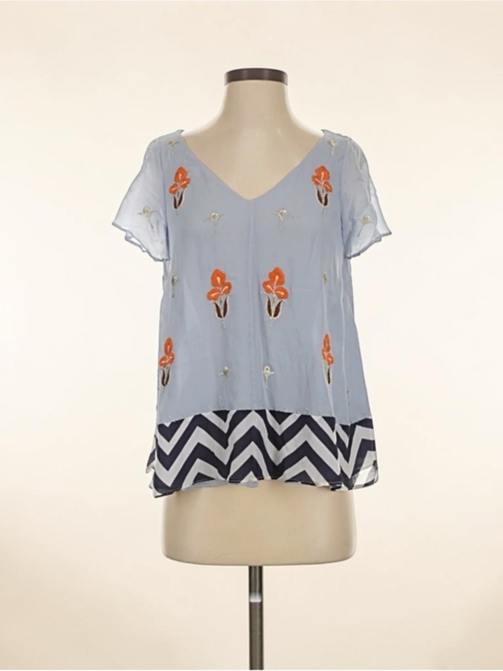 Floreat Light Blue Floral Embroidered V-Neck Top with Chevron Hem
